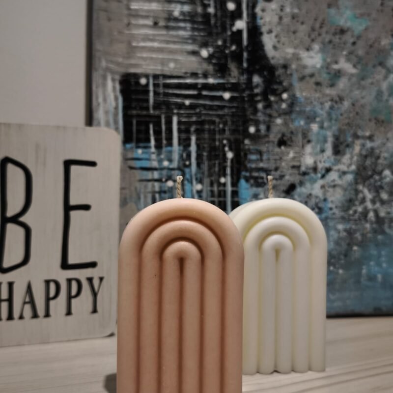 vela decorativa y aromática arociris nude y blanco con esencia de flor de algodón